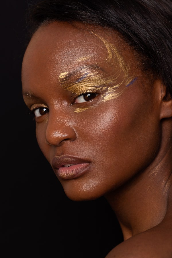 Gold and blue eye creative makeup