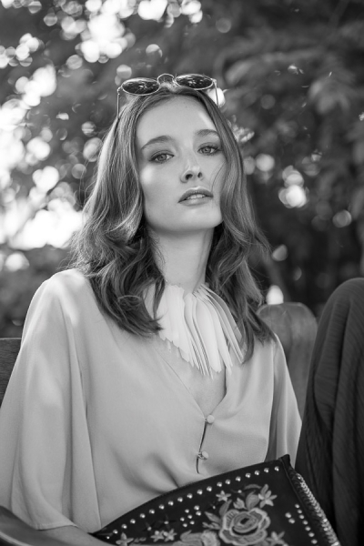 Portrait in Black and White of a model wearing a boho style outfit